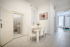 Fridge, highchair, dining tables