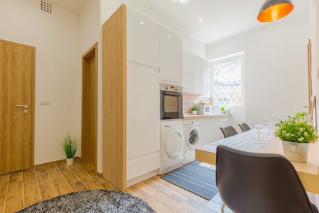Fridge, highchair, dining tables