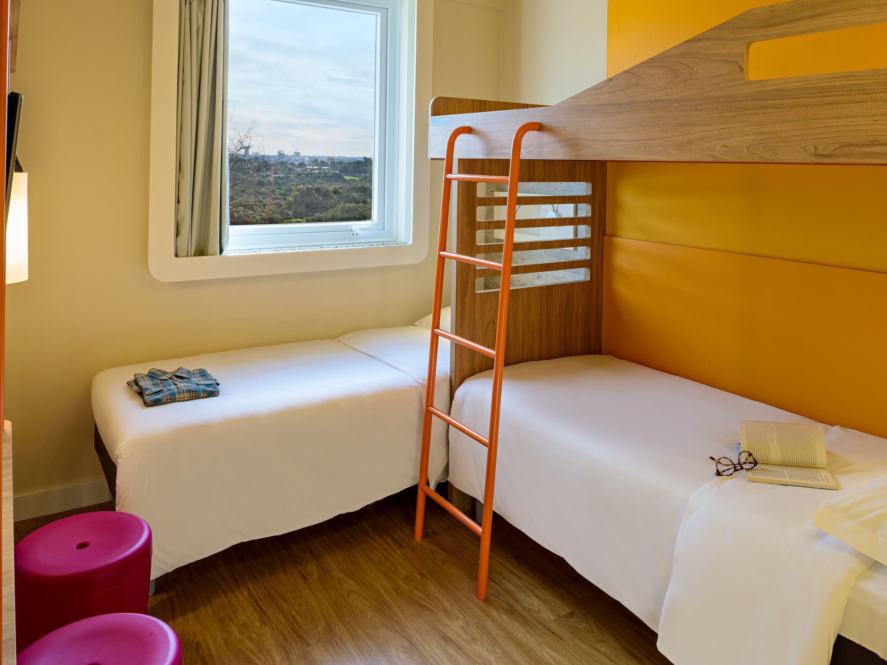 Blackout curtains, soundproofing, free WiFi, bed sheets