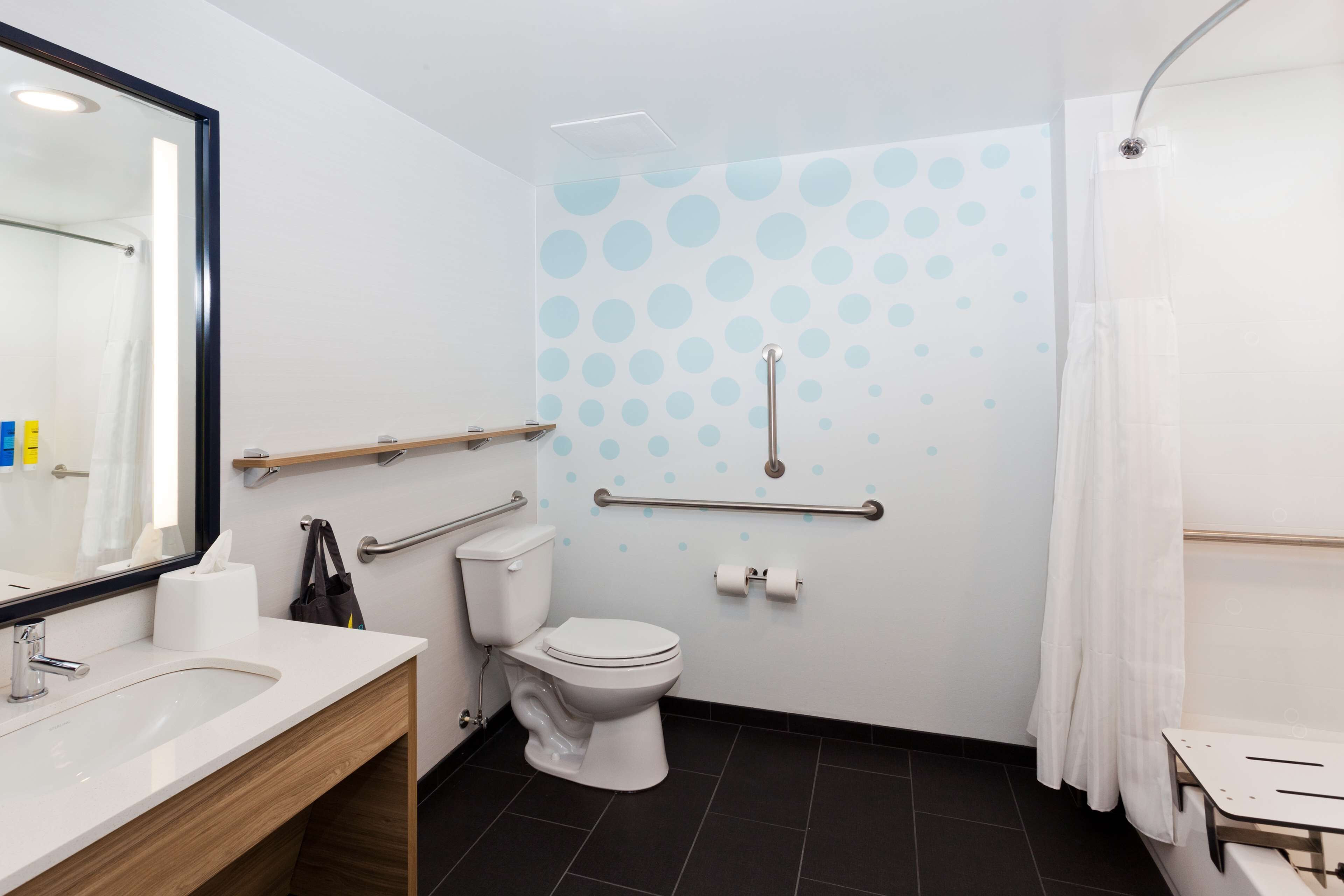 deep-soaking bathtub, rainfall showerhead, free toiletries, bathrobes