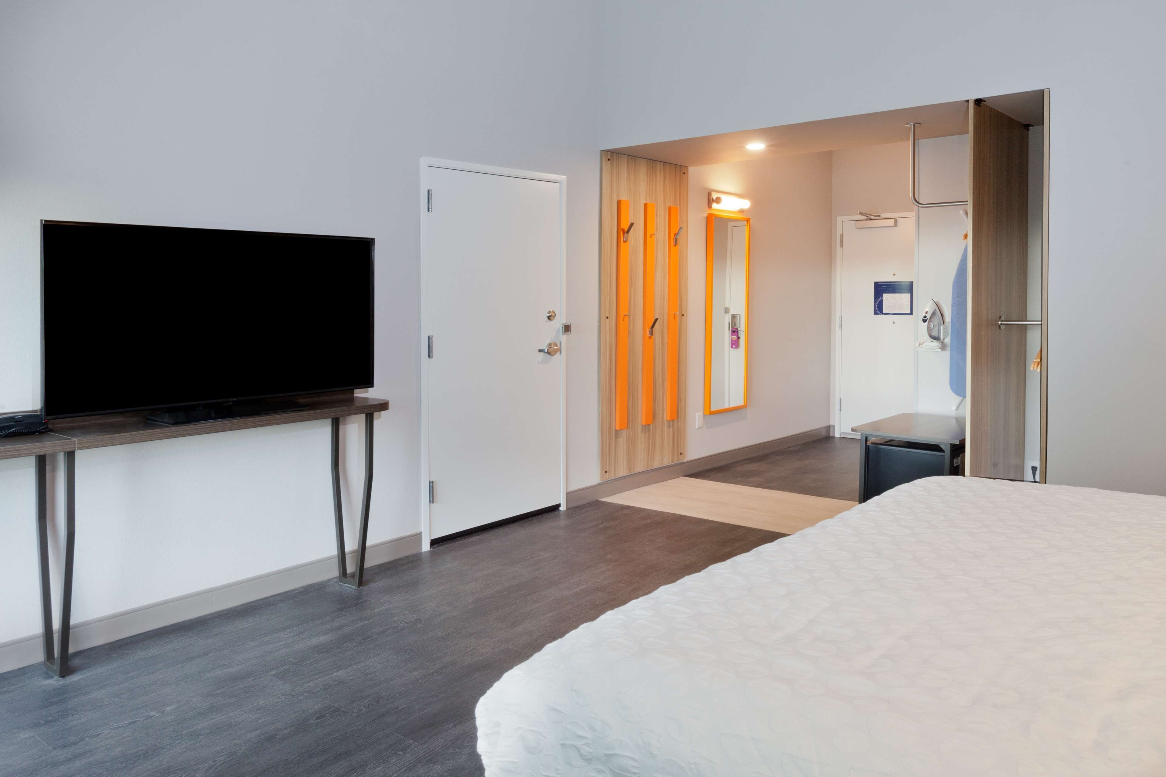 premium bedding, desk, blackout curtains, free wifi