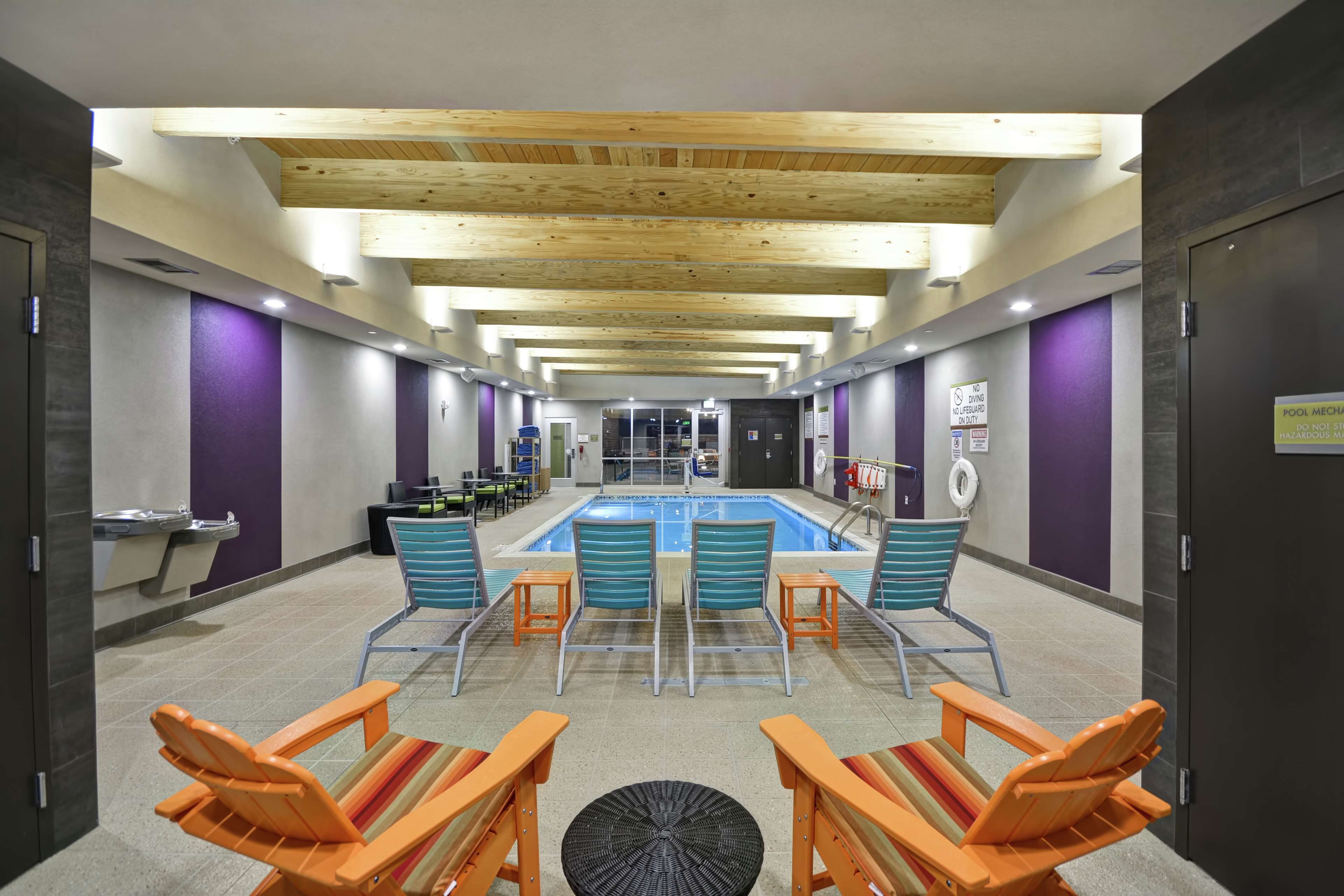 Indoor pool, open 7:00 AM to 11:00 PM, pool loungers