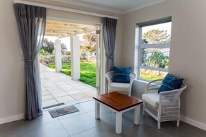 Standard Apartment, 1 Bedroom | Living area | Plasma TV - Crichton House (Cape Town)