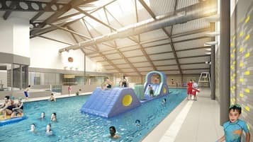 Outdoor pool, open 6:00 AM to 9:30 PM, lifeguards on site