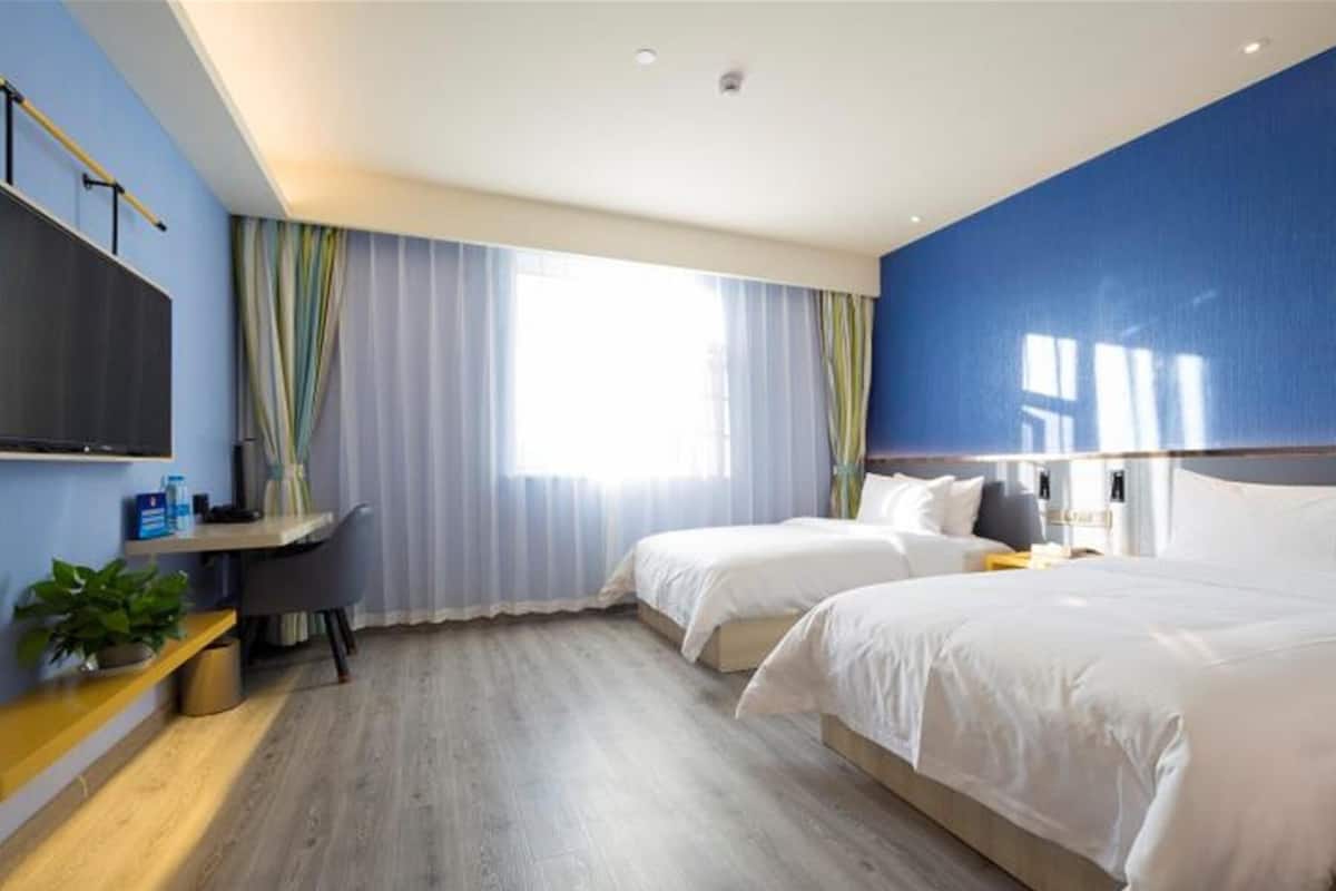 Down comforters, blackout drapes, free WiFi, bed sheets