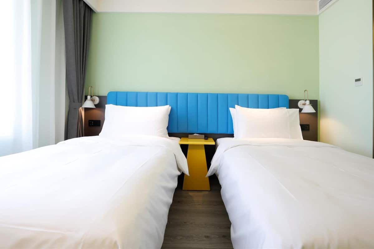Deluxe Twin Room | Down comforters, blackout drapes, free WiFi, bed sheets
