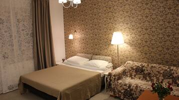 Family Studio, Kitchen | Blackout drapes, iron/ironing board, free WiFi, bed sheets