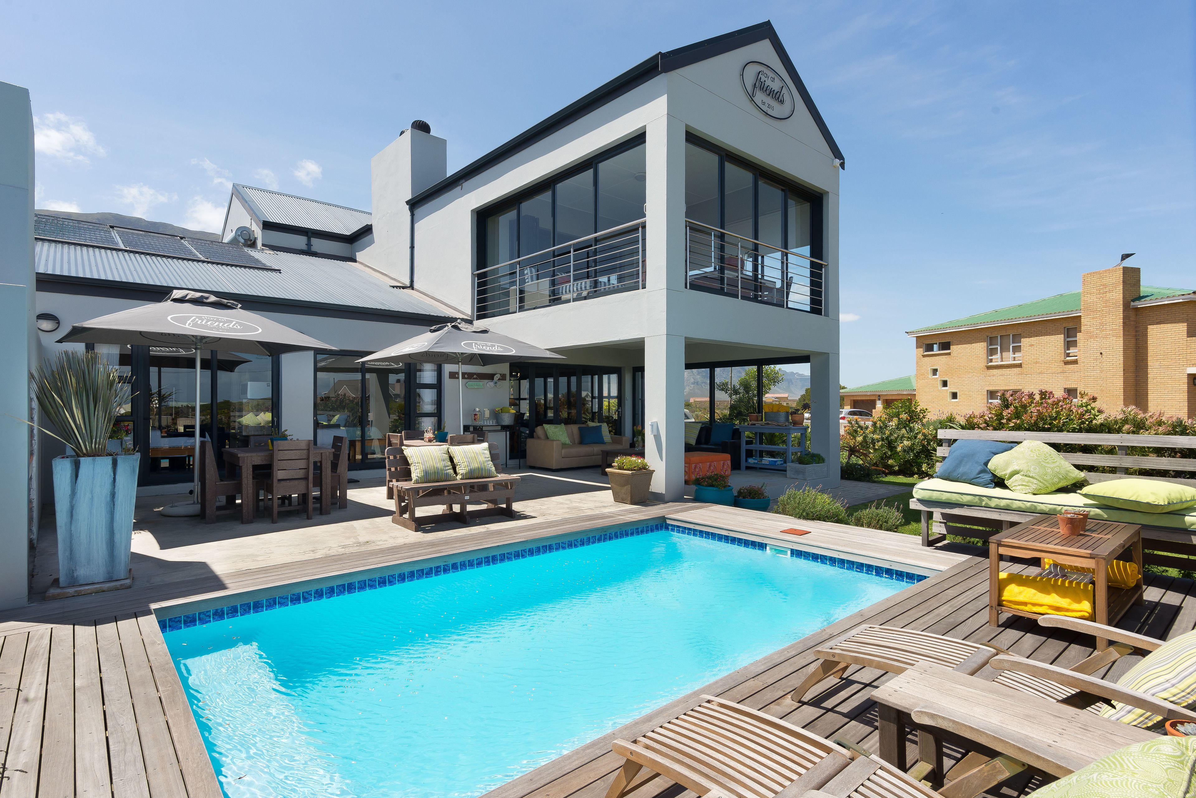 Outdoor pool, pool umbrellas, sun loungers