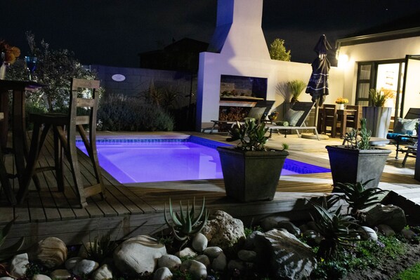 Outdoor pool, pool umbrellas, pool loungers