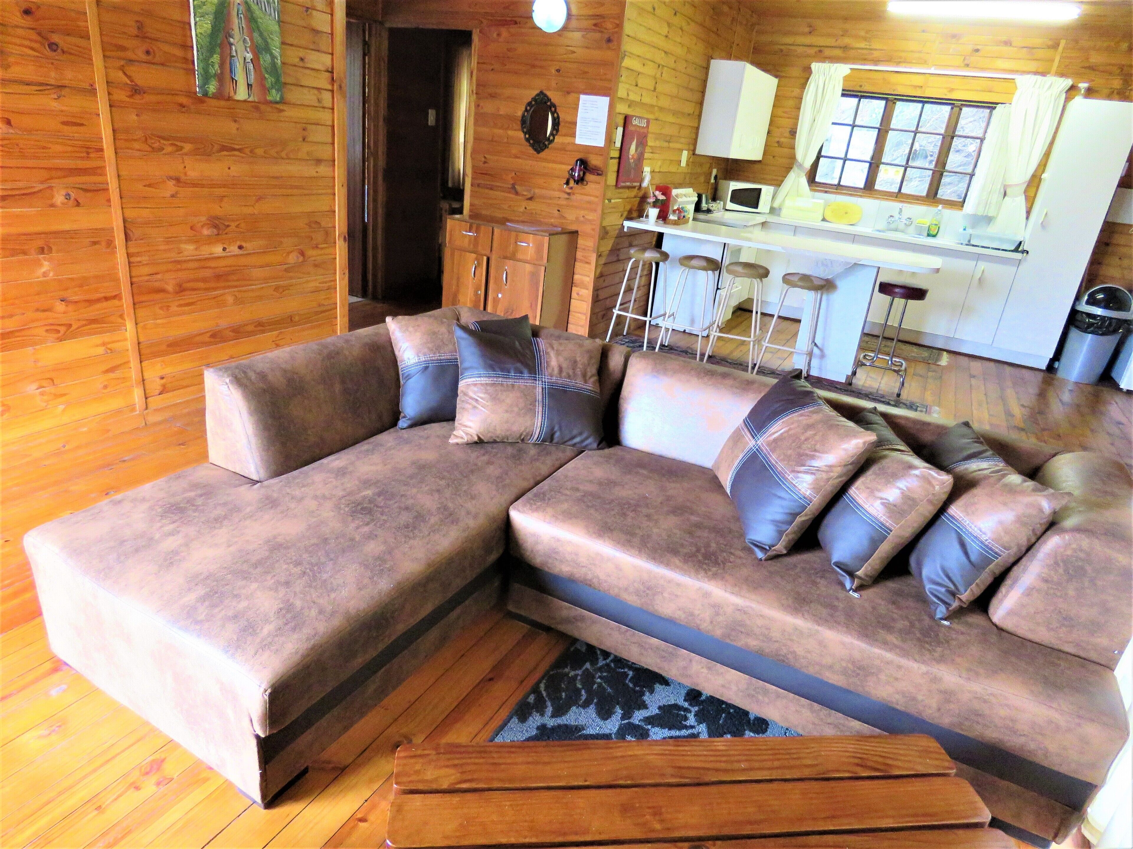 Deluxe Chalet, Garden View | Living room | 40-inch flat-screen TV with satellite channels, TV