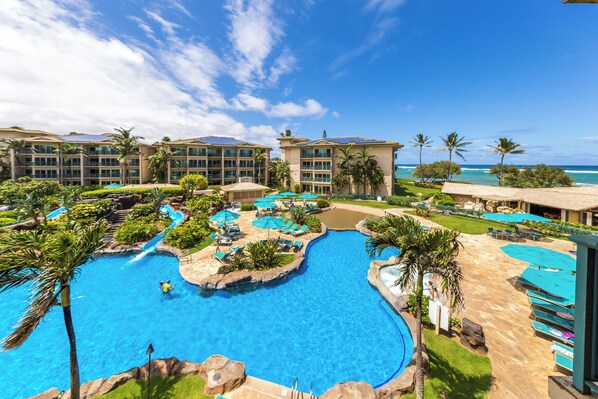 Outdoor pool, a heated pool - F104 - Two Bedroom Ground Floor Suite Steps to the Pool with AC & Reliable Wifi! (Kapaa)