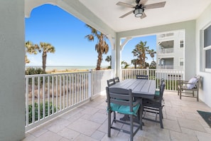 Outdoor dining - Designer Remodeled Direct Oceanfront Corner Unit 525 in Cinnamon Beach! (Palm Coast)