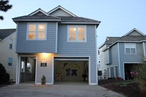 Residence 5132 features a two-story design with a garage entrance.