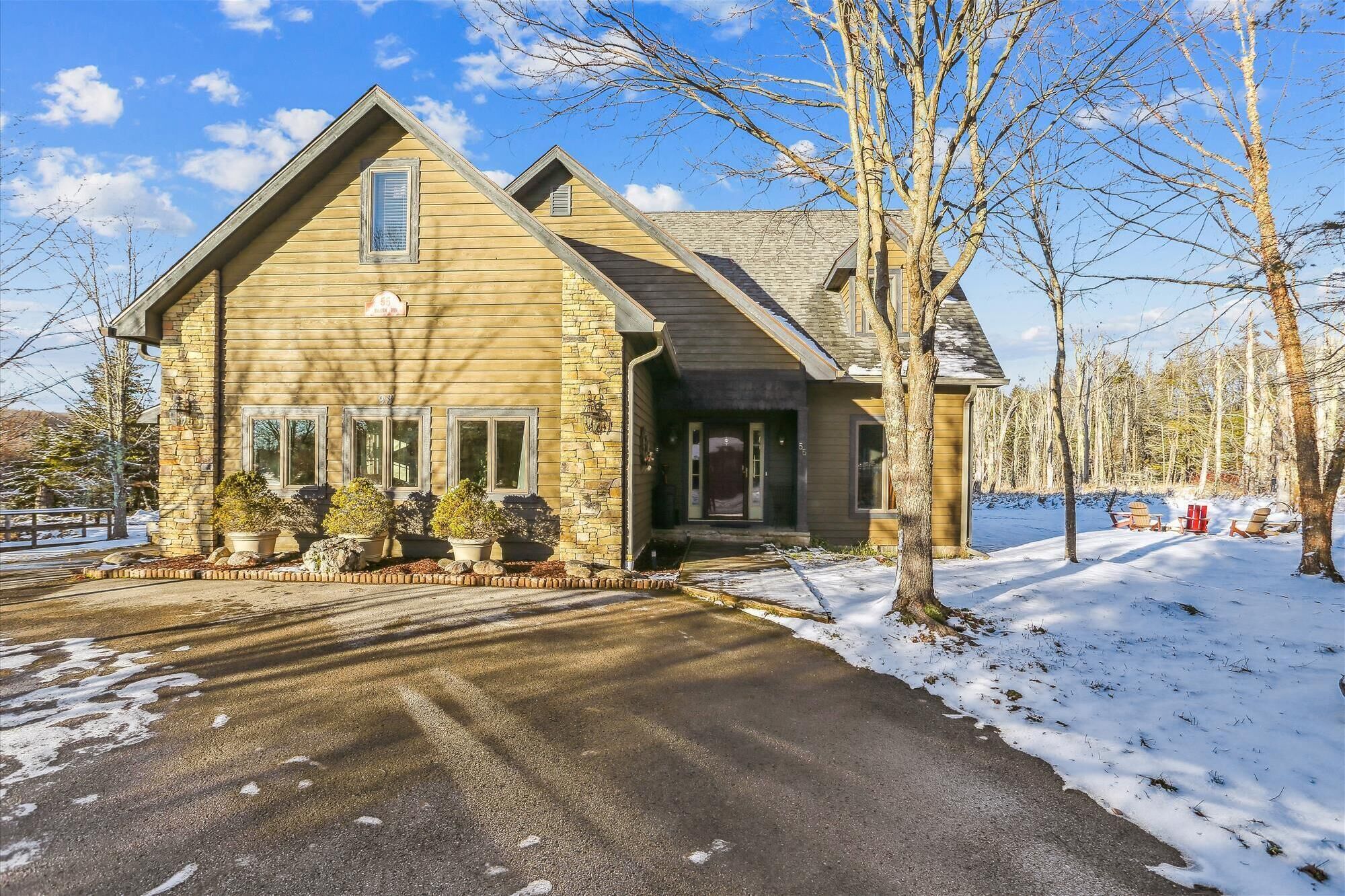 Beautiful contemporary home offers views and easy access in every season.