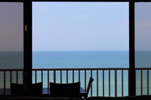 Relax and dine on the balcony with a scenic sea view.