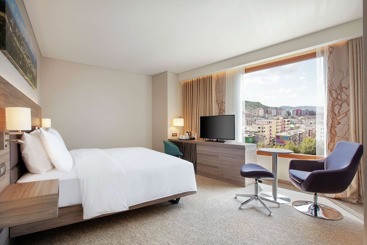 premium bedding, down duvets, pillow-top beds, in-room safe