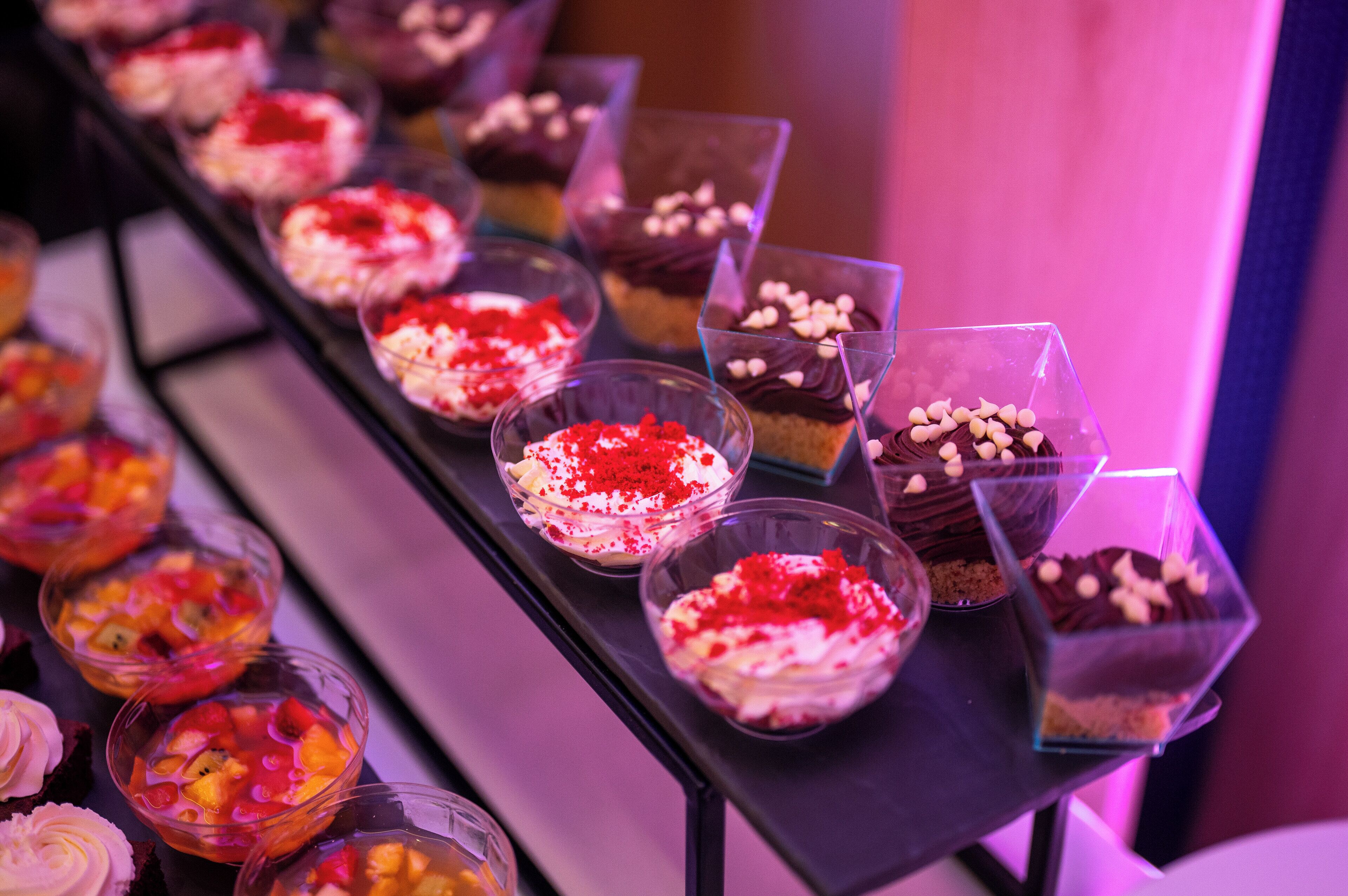 A variety of desserts arranged on a table.