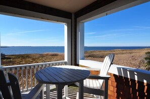 Relax on the deck with a view of the ocean and shoreline.