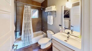 Shower, hair dryer, shampoo