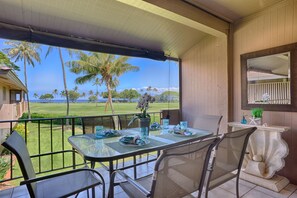 Enjoy a romantic meal for two in this serene outdoor setting overlooking the ocean.