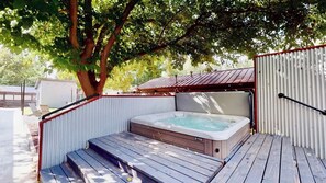 A hot tub with steps leading up to it, surrounded by a wooden deck and metal fencing. - Moab Flats - 3, Escape to Moab! Walking Distance t (Moab)