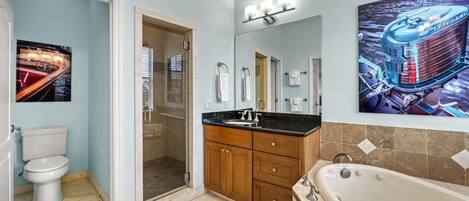 Bathroom 2, a soaking tub and separate shower give you options after a full day at the beach.