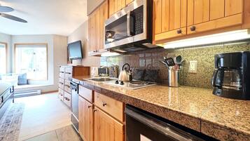 Microwave, stovetop, dishwasher, coffee/tea maker