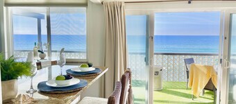 Beau condo de plage w / cuisine complète, barbecue, plage semi-privée A / C équipée
