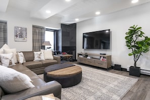 Living Room w/ 75" HD Smart TV