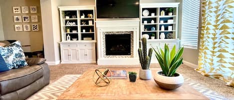 Smart TV, fireplace, video-game console, Netflix
