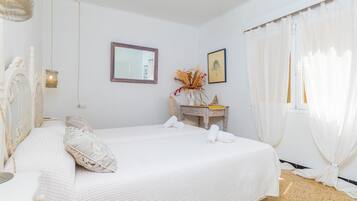 3 slaapkamers, een strijkplank/strijkijzer, gratis wifi, beddengoed