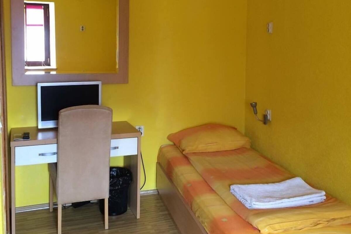 Desk, free WiFi, bed sheets