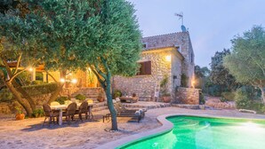 A stone villa with a swimming pool, outdoor seating, and a stone staircase leading to the entrance. - SA GARRIGA - Villa with private pool in INCA. Free WiFi (Inca)