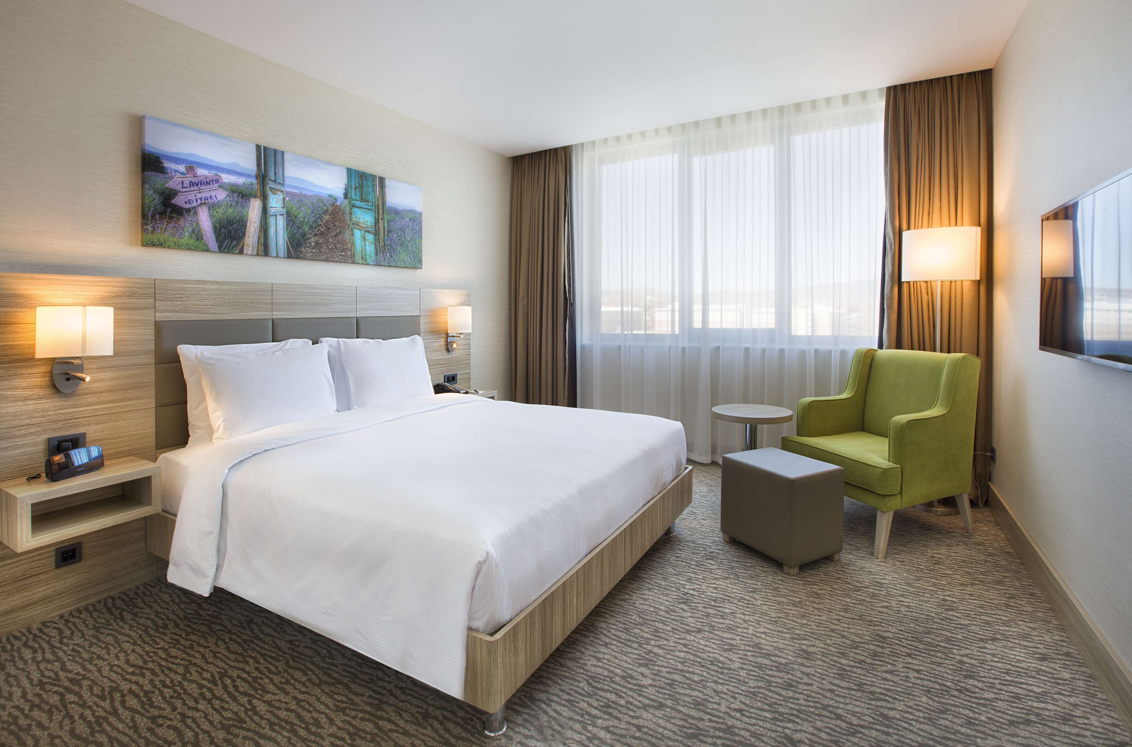 junior suite, 1 king bed | living area | lcd tv