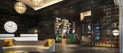 A modern lobby with a curved sofa, a large clock, and a bookshelf.