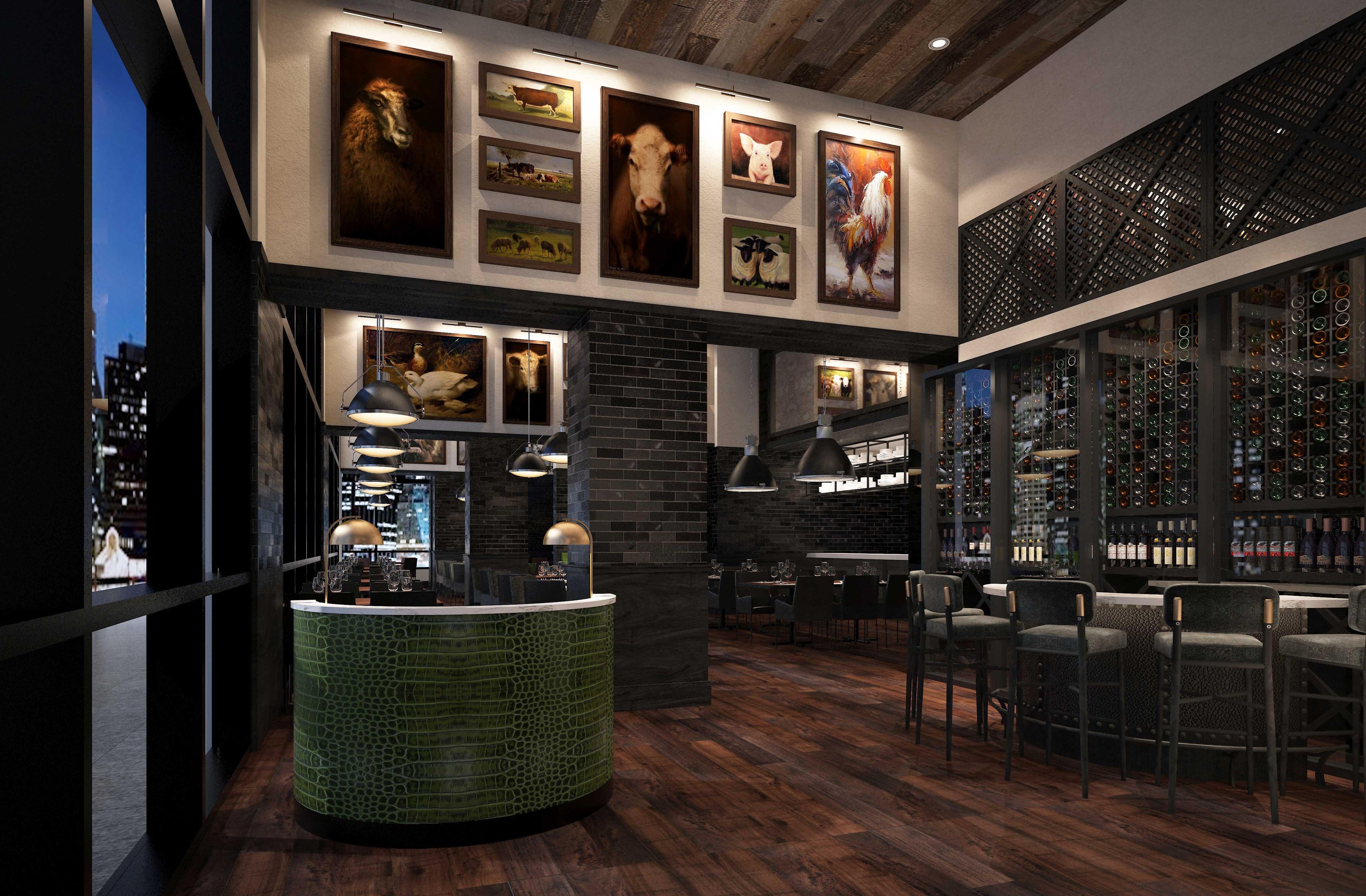 A bar area with a green countertop, multiple framed animal paintings on the wall, and a wine rack filled with bottles.