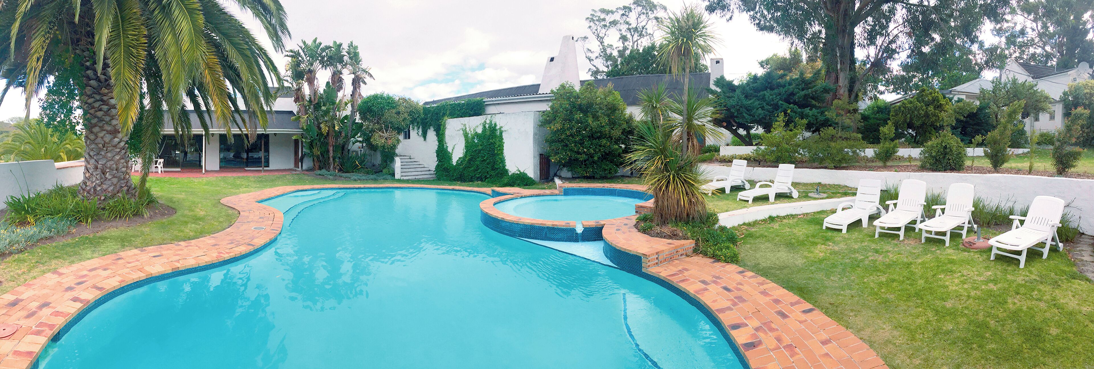 indoor pool, 2 outdoor pools, pool umbrellas, pool loungers