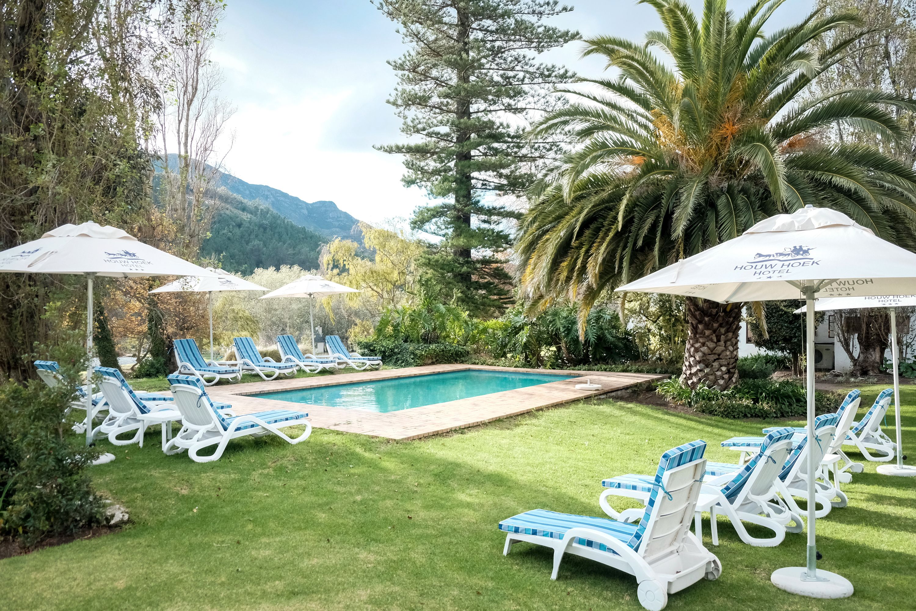 indoor pool, 2 outdoor pools, pool umbrellas, pool loungers