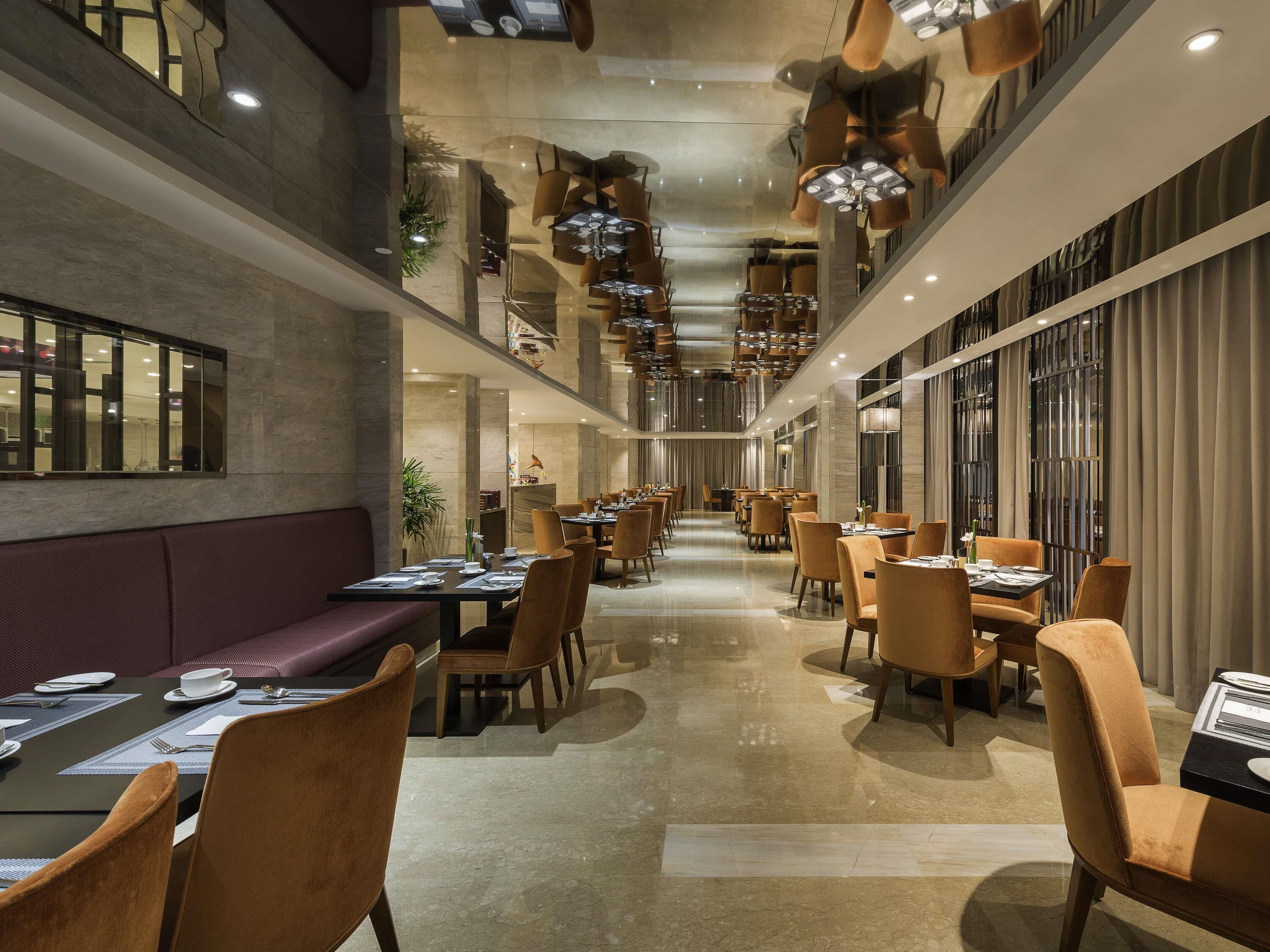 2 restaurants, breakfast, lunch, dinner served; chinese cuisine