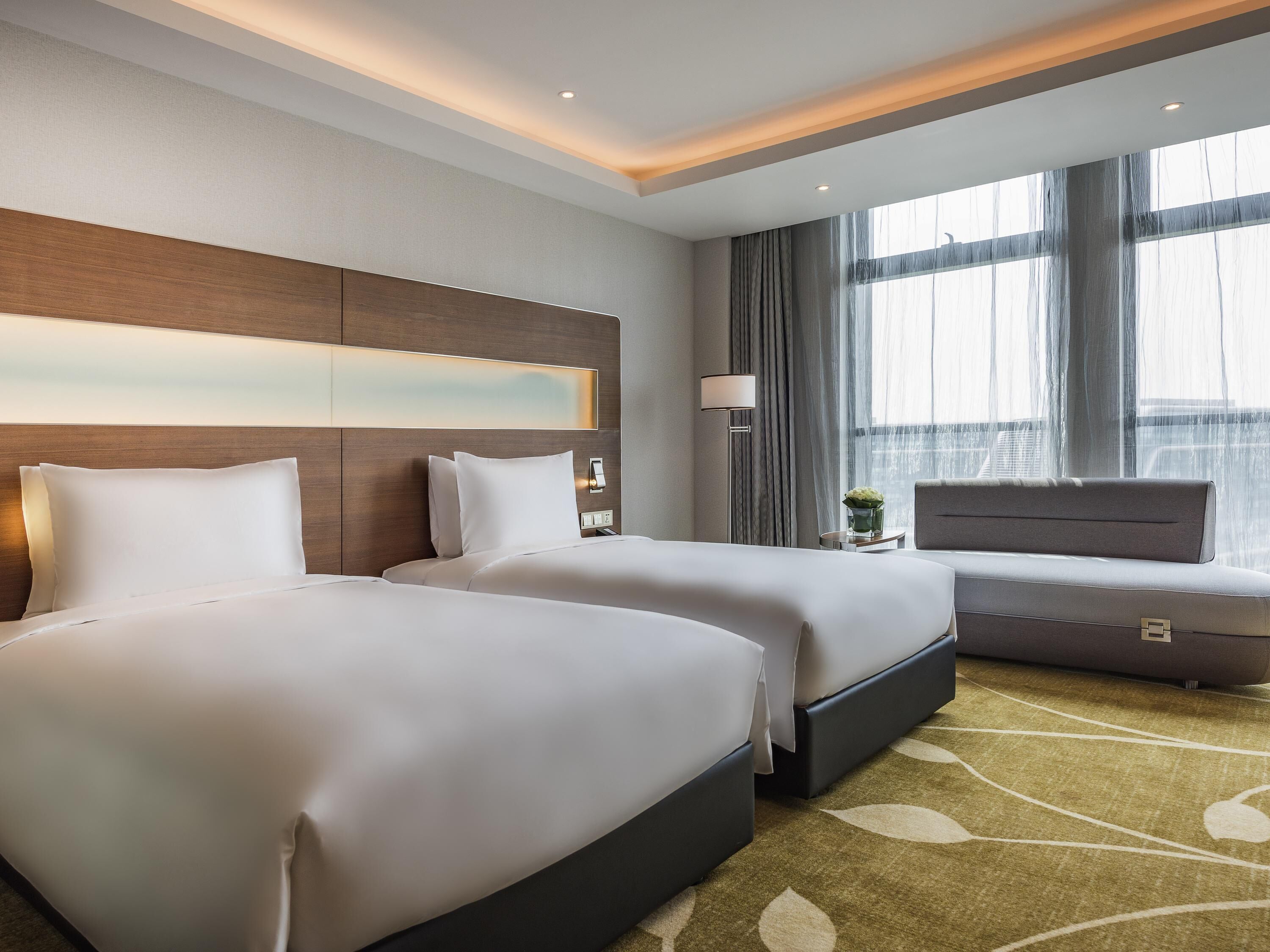 Deluxe Room, 2 Twin Beds | Free minibar items, in-room safe, desk, laptop workspace