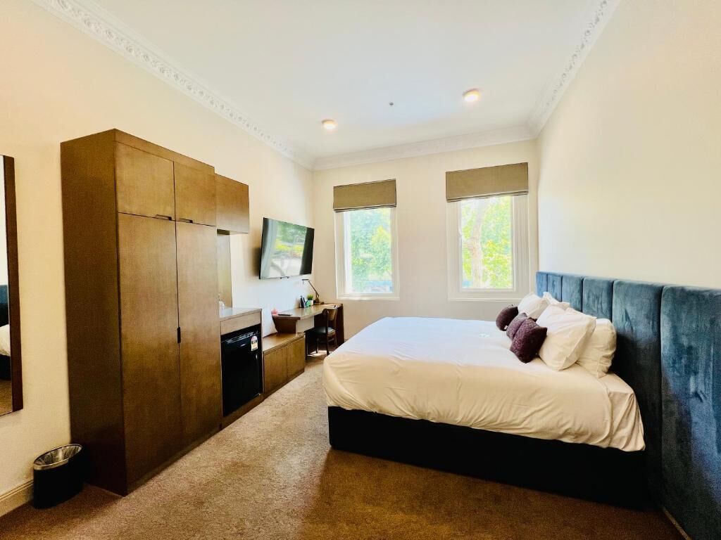 Deluxe Room | 1 bedroom, premium bedding, in-room safe, desk