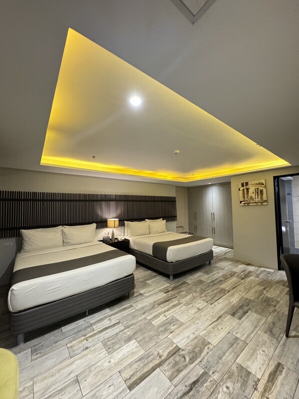 Deluxe Room, 2 Queen Beds | In-room safe, desk, laptop workspace, free WiFi - 1A Express Hotel (Cagayan de Oro)