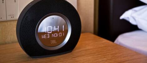 A digital clock with a black frame and a metallic face displaying the time as 10:41.