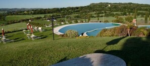 Seasonal outdoor pool, pool umbrellas, sun loungers