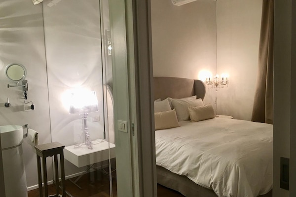 Premium bedding, down comforters, desk, soundproofing