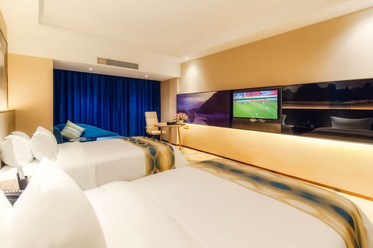 Deluxe Twin kamer | Een bureau, verduisterende gordijnen, gratis wifi