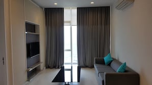 Departamento ejecutivo, 2 habitaciones | 2 habitaciones, caja de seguridad en la habitación y escritorio 