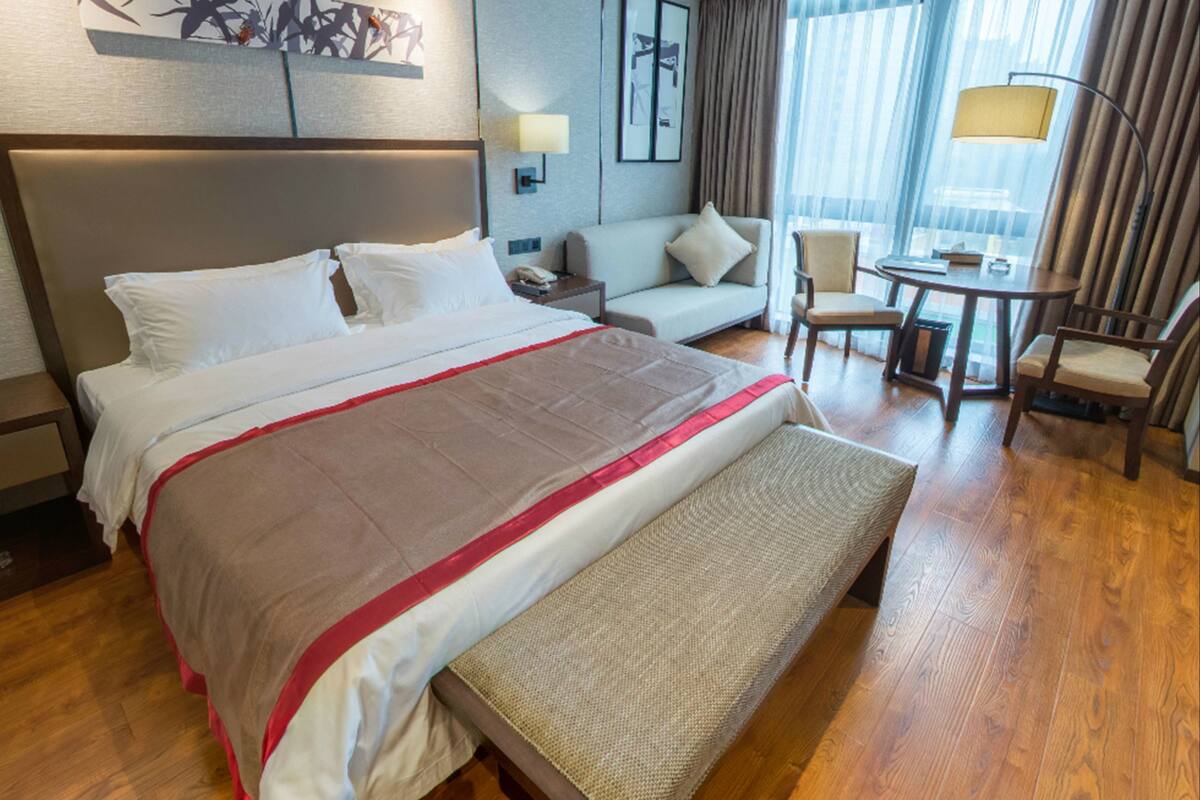 Executive Double Room | Desk, blackout drapes, iron/ironing board, free WiFi