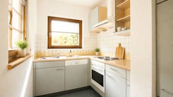 Appartamento Superior, 2 camere da letto, vista montagna, lato montagna | Cucina privata | Frigorifero, piano cottura, lavastoviglie, macchina per tè/caffè