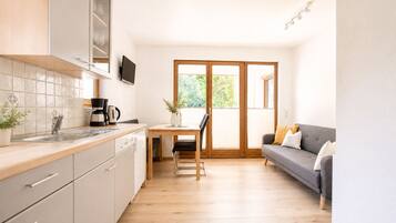 Family Apartment, 2 Bedrooms, Mountain View, Slope side | Private kitchen | Fridge, stovetop, dishwasher, coffee/tea maker